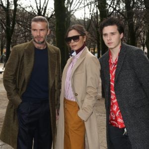 David Beckham, Victoria Beckham et Brooklyn Beckham assistent au défilé Louis Vuitton Mode Masculine Automne/Hiver 2018-2019 pendant la Fashion Week de Paris, France en janvier 2018. @ Jerome Domine/ABACAPRESS.COM