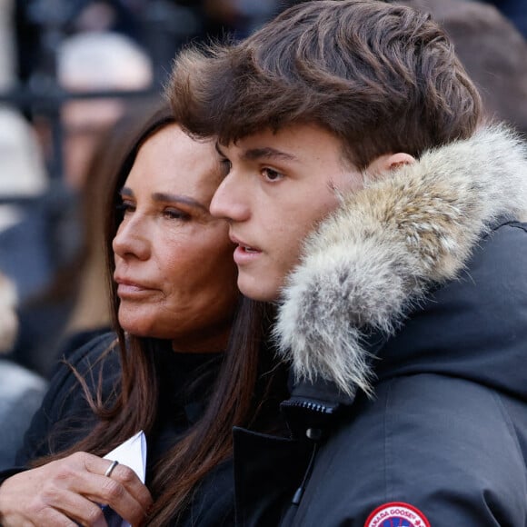Nathalie Marquay et son fils Tom - La famille de Jean-Pierre Pernaut à la sortie des obsèques en la Basilique Sainte-Clotilde à Paris le 9 mars 2022. © Cyril Moreau/Bestimage