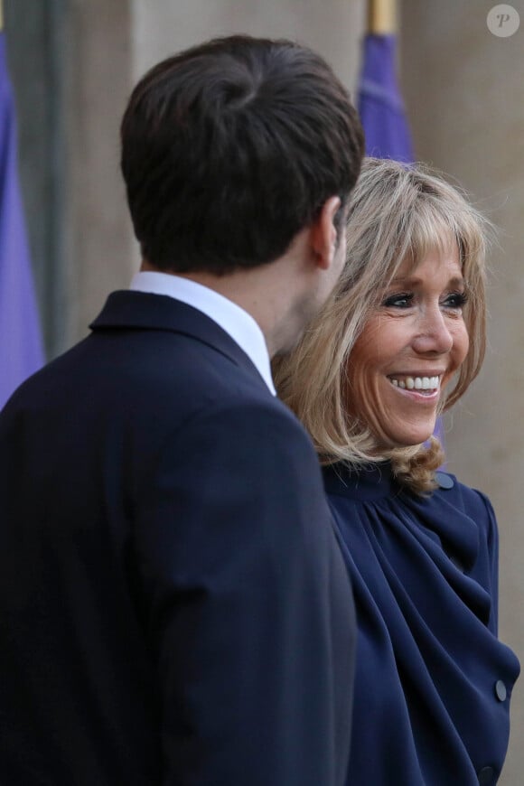 Le président Emmanuel Macron, la première dame Brigitte Macron - Le président de la République française et sa femme accueillent le roi et la reine de Jordanie au palais de l'Elysée à Paris le 29 mars 2019.