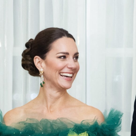 Le prince William, duc de Cambridge et Catherine (Kate) Middleton, duchesse de Cambridge, assistent au dîner du gouverneur général à King's House à Kingston lors de leur voyage officiel en Jamaique, le 23 mars 2022. 