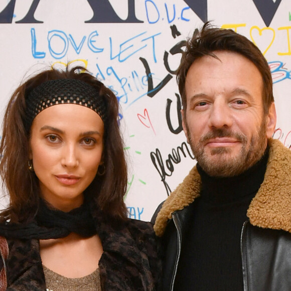 Exclusif - Samuel Le Bihan et sa nouvelle compagne Stefania Cristian - People lors de la présentation de la collection capsule de la maison Lanvin "Poetry in Motion", une nouvelle ligne jeune "surfer" , à la boutique Lanvin à Paris. Le 8 décembre 2021 © Veeren / Bestimage 