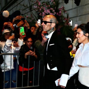 Travis Barker, Kourtney Kardashian - Les célébrités quittent leurs hôtels pour se rendre à la soirée du "MET Gala 2022" à New York, le 2 mai 2022.