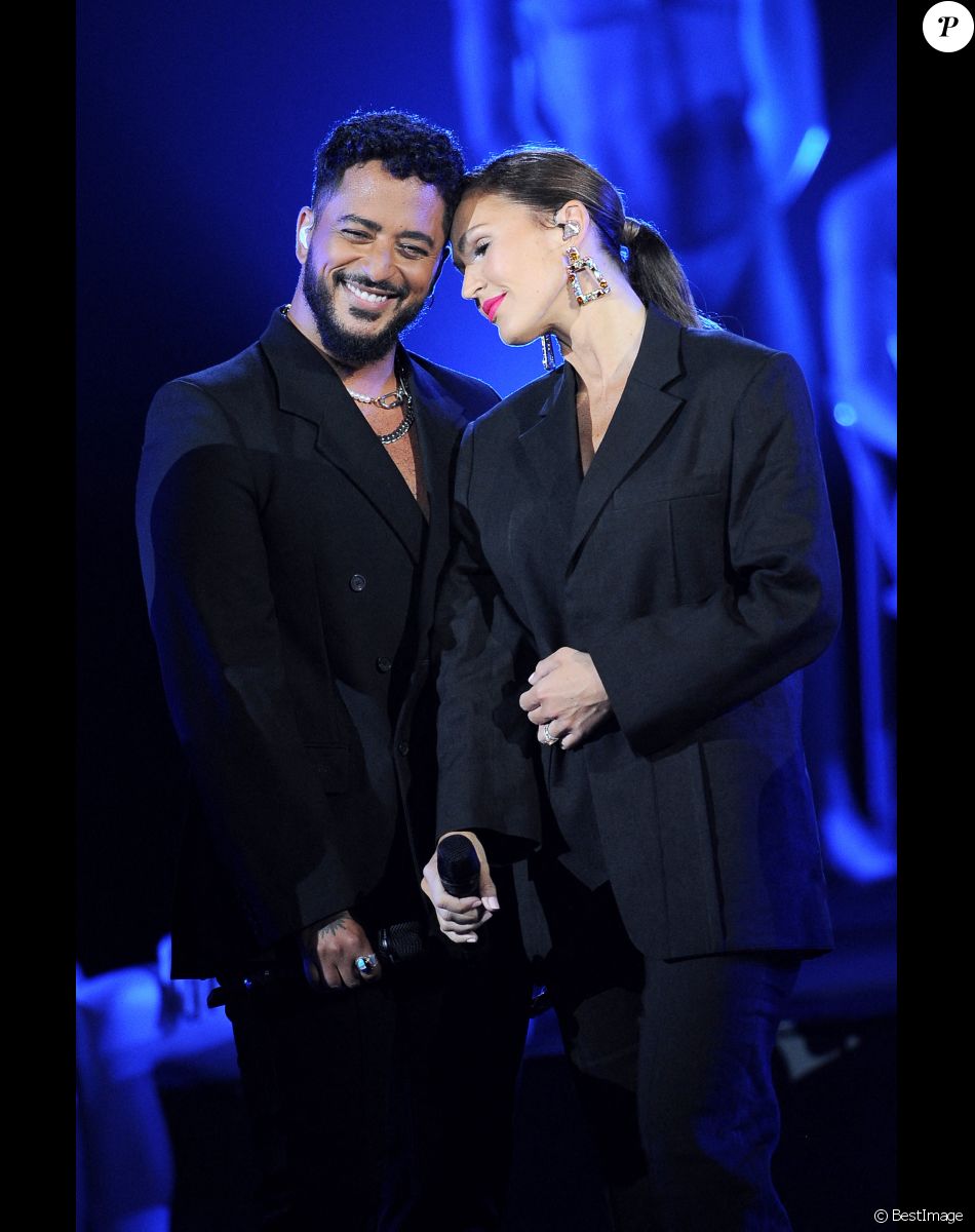 Exclusif - No Web - No Tabloids - Vitaa et Slimane - Enregistrement de la 2ème partie de soirée de l'émission "La Chanson secrète 9" à la Seine musicale à Paris, diffusée le 27 novembre sur TF1 à 21h05 Après le succès des précédentes éditions, « LA CHANSON SECRETE », présentée par N.Aliagas et produite par DMLS TV, revient sur TF1.& 8232;10 artistes ne savent rien de ce qui va se passer pour eux !& 8232;Ils ont accepté de jouer le jeu, de se laisser totalement surprendre, émouvoir, parfois même déstabiliser car ils vont découvrir en même temps que les téléspectateurs une surprise : une chanson qui leur est chère revisitée et réinterprétée par un artiste.& 8232; Des mises en scène spectaculaires au service de l’émotion… Et des émotions fortes pour l’artiste assis dans le fauteuil grâce à la venue sur le plateau de proches et d’invités inattendus.& 8232;Les téléspectateurs seront aux premières loges pour vivre ces moments d’intimité musicale rare.& 8232;Avec une surprise faite à un couple d’artistes et un anniversaire surprise sur le plateau pour l’un des invités. © Gaffiot-Moreau / Bestimage Exclusive - No Web No Blog pour Belgique et Suisse
