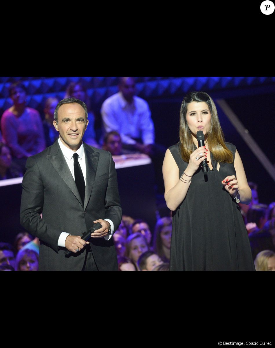 Nikos Aliagas et Karine Ferri - Plateau de la finale de l'émission "The Voice" à Paris. Le 14 mai 2016 © Coadic Guirec / Bestimage