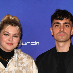 Louane et son compagnon Florian Rossi - Avant Première de " Belle " film animé japonais au Grand Rex à Paris le 6 décembre 2021