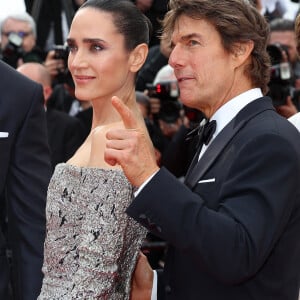 Jennifer Connelly et Tom Cruise - Montée des marches du film " Top Gun : Maverick " lors du 75ème Festival International du Film de Cannes. Le 18 mai 2022 © Cyril Moreau / Bestimage 