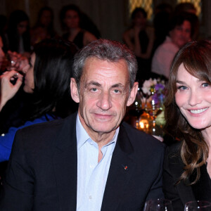 Nicolas Sarkozy et sa femme Carla Bruni-Sarkozy - Dîner des "Femmes Culottées" Etam au Musée de la Monnaie à Paris le 22 mars 2022. © Rachid Bellak/Bestimage 