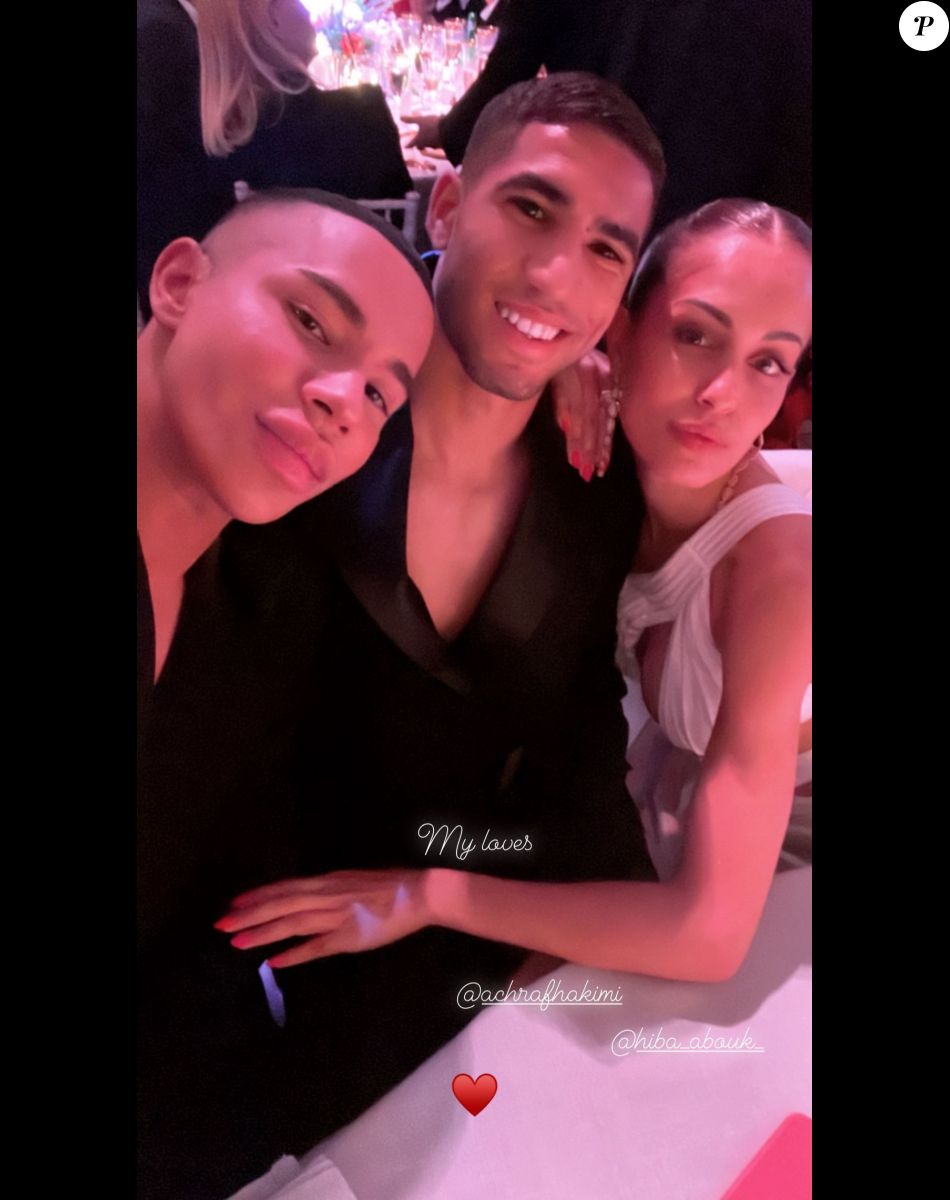 Achraf Hakimi et sa femme Hiba Abouk avec Olivier Rousteing.