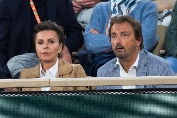 Henri Leconte et sa compagne Maria Dowlatshahi - People dans les tribunes lors des Internationaux de France de tennis de Roland Garros à Paris, France, le 25 mai 2022. 