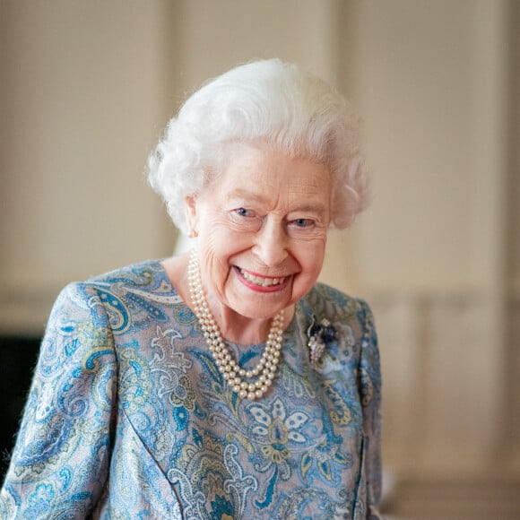 La reine Elisabeth II d'Angleterre reçoit Ignazio Cassis (président de la Confédération suisse) et sa femme Paola, au Palais de Buckingham. Londres, le 28 avril 2022. 