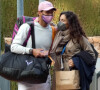 Rafael Nadal et sa femme Xisca Perello quittent le stade où le joueur vient de rencontrer Ilya Ivashka au tournoi Conde de Godo à Barcelone le 21 avril 2021.