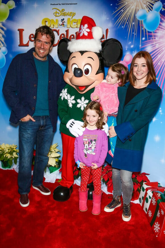 Alyson Hannigan et Ehemann Alexis Denisof avec leurs filles Satyana Marie Denisof et Keeva Jane Denisof à la soirée "Disney on Ice Let's Celebrate!" à Los Angeles, le 11 décembre 2014 