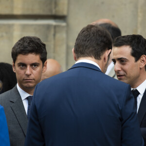 Christophe Castaner, ministre de l'Intérieur, Stéphane Séjourné et Gabriel Attal lors du discours aux armées d'Emmanuel Macron à l'Hôtel de Brienne, siège du ministère des Armées. Emmanuel Macron a annoncé la création d'un commandement de l'espace, qui sera créé à l'automne au sein de l'armée de l'Air. Paris, le 13 juillet 2019