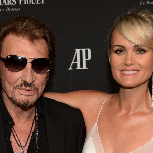 Exclusif - Johnny Hallyday et sa femme Laeticia Hallyday - La maison Audemars Piguet a célébré le lancement de la nouvelle Millenary Femme au Carreau du Temple à Paris le 6 juillet 2015 .