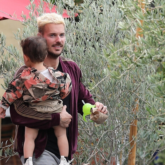 Matt Pokora (M. Pokora), sa femme Christina Milian et leur fils Isaiah sont allés déjeuner au restaurant Mauro's Cafe à West Hollywood, Los Angeles, le 7 juin 2021. Veuillez flouter le visage des enfants avant publication 