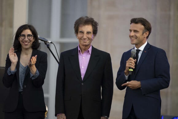 Rima Abdul-Malak, ministre de la Culture, Jack Lang et Emmanuel Macron, président de la République lors de la fête de la musique au palais de l'Elysée à Paris le 21 juin 2022