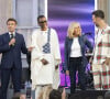 Emmanuel Macron, président de la République, Youssou N'Dour, Brigitte Macron (veste en cuir Jitrois), Charlie Winston lors de la fête de la musique au palais de l'Elysée à Paris le 21 juin 2022