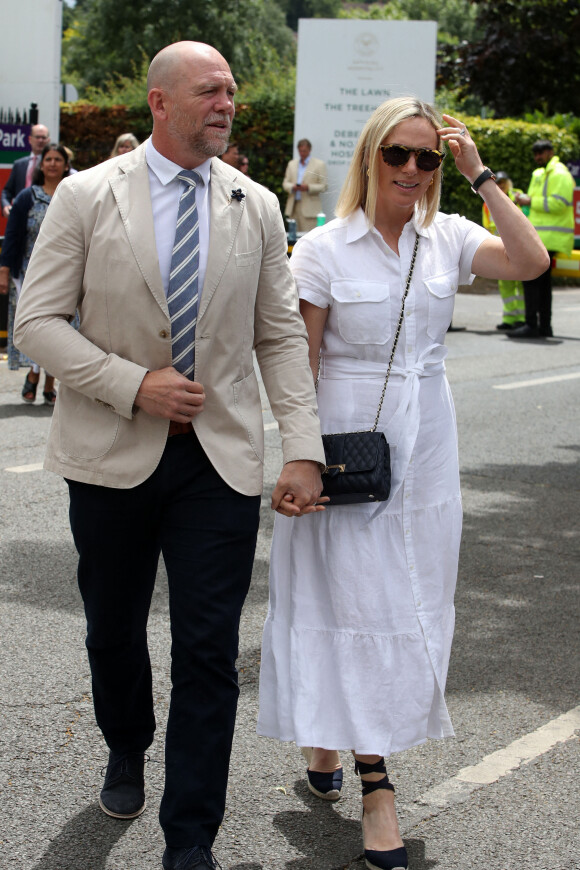 Mike Tindall et sa femme Zara Phillips à leur arrivée au stade de Wimbledon, à l'occasion de la deuxième journée du tournoi de tennis. Le 28 juin 2022.
