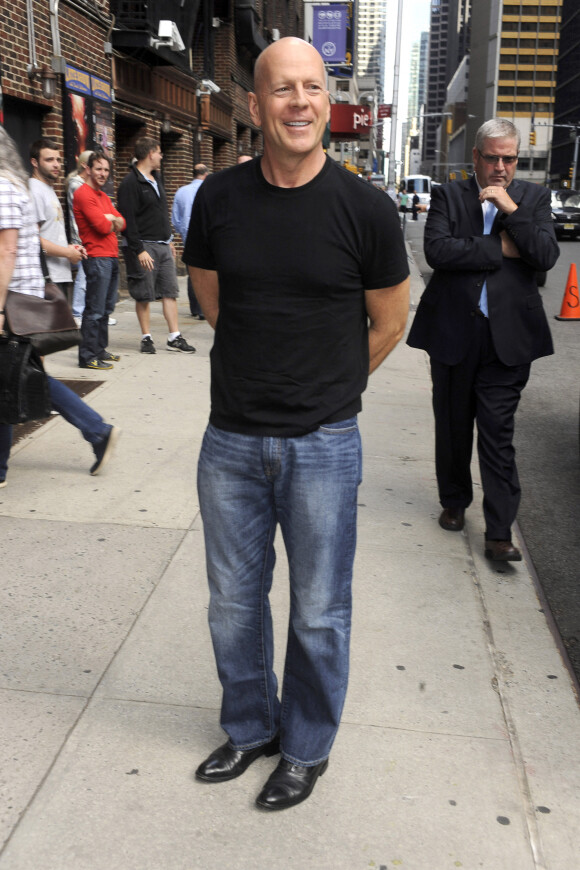 Bruce Willis arrive dans les studios de l'émission "Late Show With David Letterman" à New York. Le 18 août 2014 