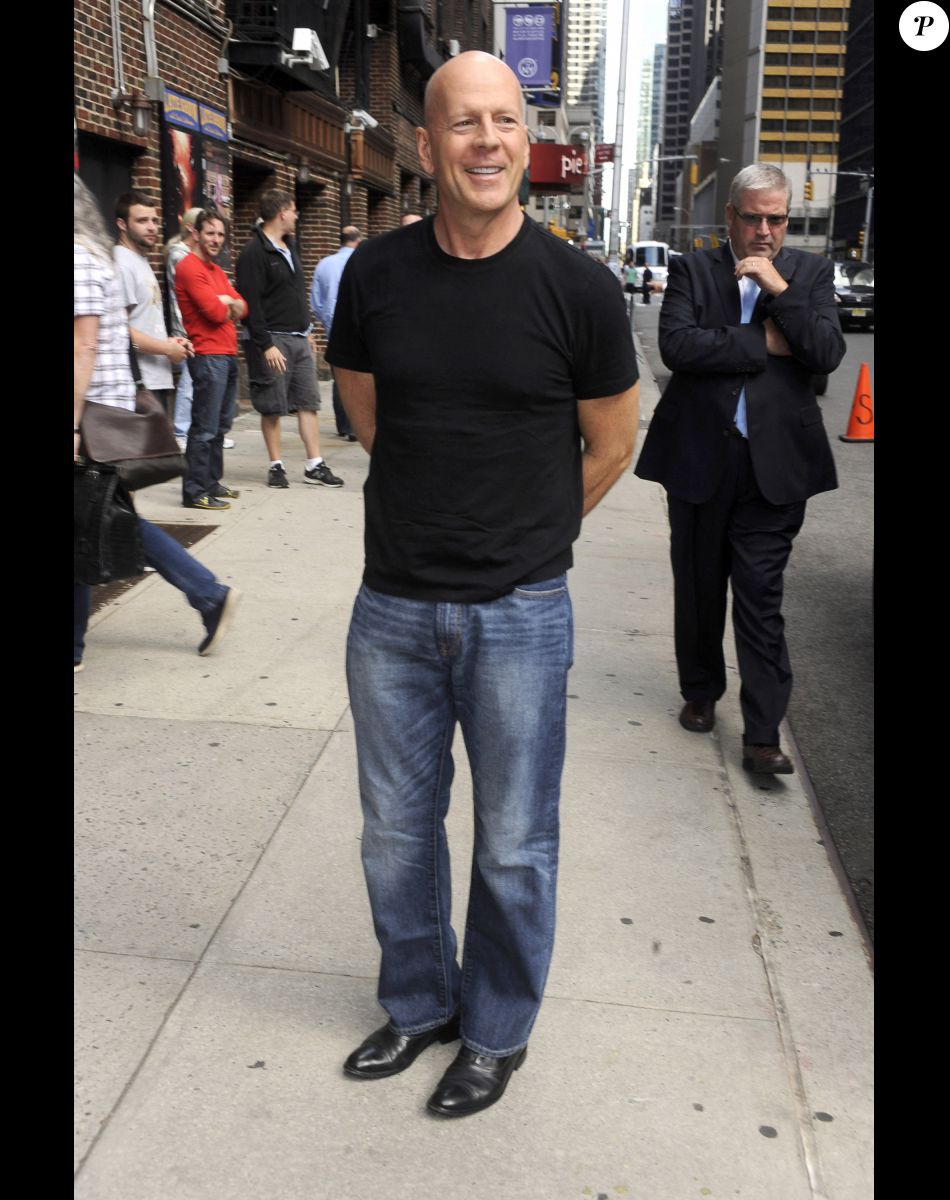 Bruce Willis arrive dans les studios de l'émission "Late Show With David Letterman" à New York. Le 18 août 2014