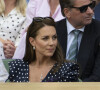 Le prince George de Cambridge - Catherine (Kate) Middleton remet le trophée à Novak Djokovic, vainqueur du tournoi de Wimbledon le 10 juillet 2022.