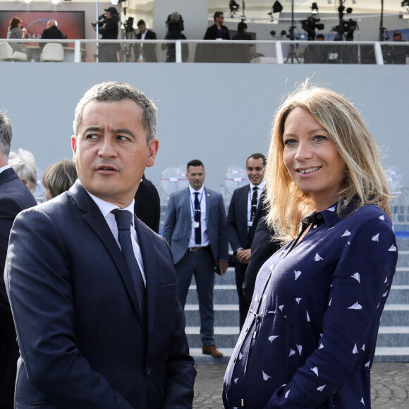 Info - Gérald Darmanin bientôt papa pour la deuxième fois - Gérald Darmanin, Ministre de l'intérieur et sa femme Rose-Marie Devillers (enceinte) - Le président français assiste au défilé, place de la Concorde, Paris, © Stéphane Lemouton / Bestimage