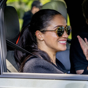 Le prince Harry et Meghan Markle lors du "Land Rover Challenge" au premier jour des Invictus Games 2020 à La Haye, le 16 avril 2022. 