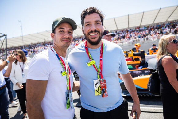 Jérémy Ferrari et Redouane Bougheraban - Les célébrités lors du Grand Prix de France de Formule 1 (F1) sur le circuit Paul Ricard au Castellet, le 24 juillet 2022. 