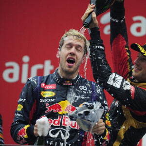 Sebastian Vettel (GER, Infiniti Red Bull Racing), 8 Romain Grosjean (FRA, Lotus F Team), - Sebastian Vettel, vainqueur du Grand Prix de Formule de New-Delhi en Inde et quadruple champion du Monde le 27 octobre 2013.