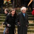 Jean Rochefort et son épouse lors des obsèques de Pierre Vaneck, qui se sont tenues en l'église Saint-Roch, à Paris, le 6 février 2010.