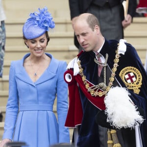 Le prince William, duc de Cambridge, et Catherine (Kate) Middleton, duchesse de Cambridge, lors de la cérémonie de l'ordre de la Jarretière à la chapelle Saint-Georges du château de Windsor. Cette année pour la première fois Camilla Parker Bowles, duchesse de Cornouailles, a été investie comme nouveau chevalier de l'ordre de la Jarretière par la reine et a pu participer à la procession au côté du prince Charles. Londres, la 13 juin 2022. 