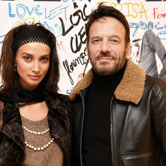 Info - Première sortie officielle de Samuel Le Bihan et sa nouvelle compagne Stefania Cristian - Exclusif - Samuel Le Bihan et sa nouvelle compagne Stefania Cristian - People lors de la présentation de la collection capsule de la maison Lanvin "Poetry in Motion", une nouvelle ligne jeune "surfer" , à la boutique Lanvin à Paris. Le 8 décembre 2021 © Veeren / Bestimage 