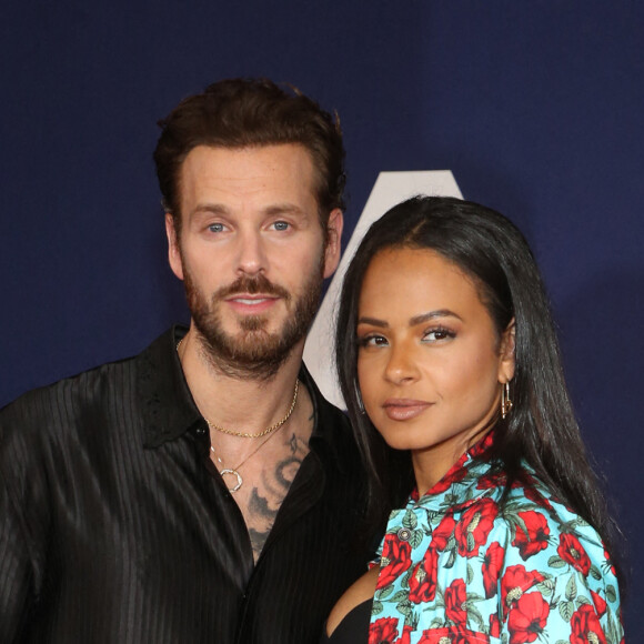 Matt Pokora et sa femme Christina Milian au photocall lors de la première du film "Ambulance" à Los Angeles le 4 avril 2022. 