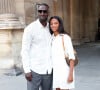 Omar Sy et sa fille Selly lors du défilé de mode Homme printemps-été 2023 Louis Vuitton dans la cour Carrée du Louvre à Paris, le 23 juin 2022. © Bertrand Rindoff/Bestimage