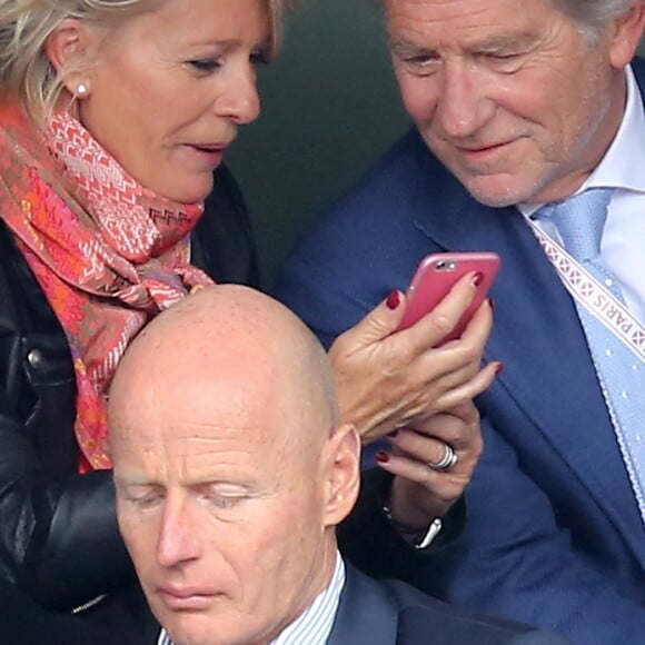 Sophie Davant et William Leymergie - People dans les tribunes des Internationaux de France de tennis de Roland Garros à Paris. Le 26 mai 2015 