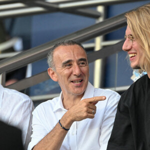 Paul Mirabel, Elie Semoun - Célébrités au Match de football en ligue 1 Uber Eats PSG - Montpellier (5-2) au Parc des Princes à Paris, France le 13 Août 2022. © Lionel Urman / Panoramic / Bestimage