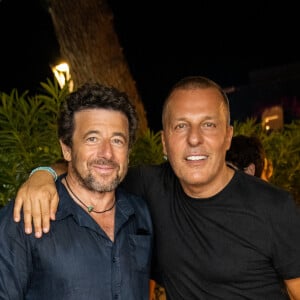 Exclusif - Patrick Bruel, Jean-Roch - People au VIP Room à Saint-Tropez le 6 août 2022. © Hippolyte Hamonet / Bestimage 