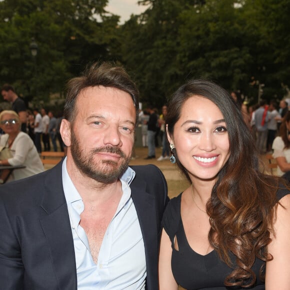 Samuel Le Bihan et sa compagne Angie Vu Ha (enceinte) - People et Backstage du Grand concert de Musique classique du 14 juillet au Champs de Mars à Paris. Le 14 juillet 2018 © Guirec-Gorassini-Veeren / Bestimage 