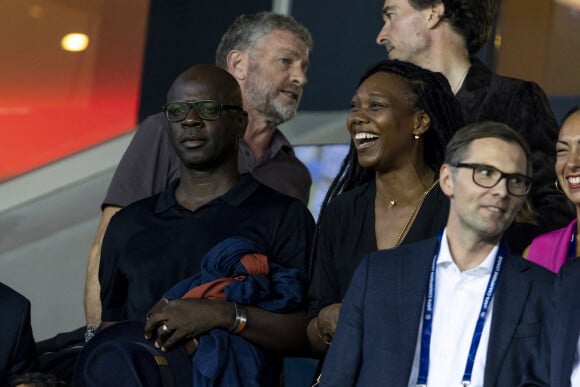 Les jeunes mariés Lilian Thuram et Kareen Guiock - People assistent au match aller de la Ligue des Champions entre le Paris Saint-Germain contre la Juventus (2-1) au Parc des Princes à Paris le 6 septembre 2022.