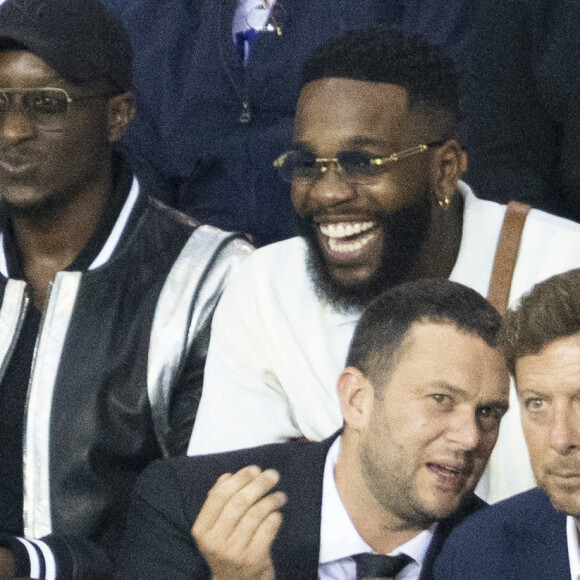 Tayc et Ahmed Sylla - People assistent au match aller de la Ligue des Champions entre le Paris Saint-Germain contre la Juventus (2-1) au Parc des Princes à Paris le 6 septembre 2022.