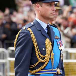 Le prince William derrière le cercueil de sa grand-mère Elizabeth II. @ James Manning/PA Wire.