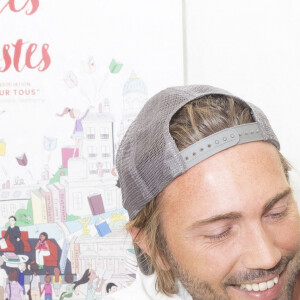 Ghislain Gerin et son mari Christophe Beaugrand - Festival des Livres et des Artistes organisé par l'association "Lecture pour Tous" engagée dans la lutte contre l'illettrisme au Mail Branly à Paris le 2 juillet 2022. © Pierre Perusseau/ Jack Tribeca / Bestimage 