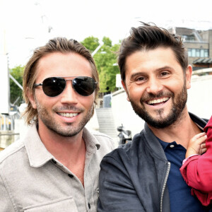 Christophe Beaugrand, son mari Ghislain Gerin et leur fils Valentin - Soirée d'anniversaire des 5 ans de la marque Joone, sur la péniche La Barge à Issy-les-Moulineaux. Paris, le 30 juin 2022 © Veeren / Bestimage