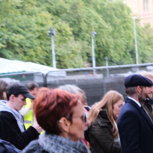 David Beckham vient rendre un hommage à la reine Elizabeth II d'Angleterre à Westminster Hall à Londres, le le 16 septembre 2022. L'ancien footballeur attend son tour dans la file d'attente au milieu des Britanniques et des touristes. Les funérailles de la souveraine se dérouleront le 19 septembre 2022.