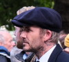 David Beckham vient rendre un hommage à la reine Elizabeth II d'Angleterre à Westminster Hall à Londres. L'ancien footballeur attend son tour dans la file d'attente au milieu des Britanniques et des touristes.
