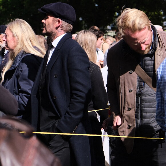 David Beckham vient rendre un hommage à la reine Elizabeth II d'Angleterre à Westminster Hall à Londres, le le 16 septembre 2022. L'ancien footballeur attend son tour dans la file d'attente au milieu des Britanniques et des touristes. Les funérailles de la souveraine se dérouleront le 19 septembre 2022.