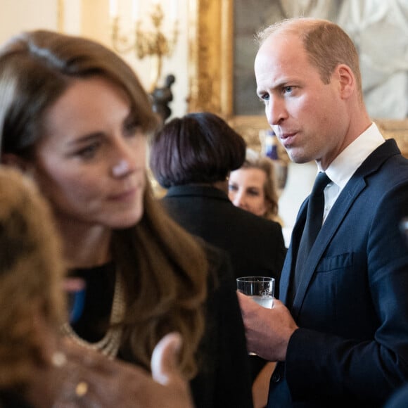 Le prince William, prince de Galles, et Catherine (Kate) Middleton, princesse de Galles - La famille royale d'Angleterre reçoit les gouverneurs généraux des nations du Commonwealth lors d'un déjeuner au palais de Buckingham à Londres, le 17 septembre 2022. 