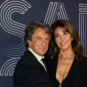 François Cluzet et sa femme Narjiss Slaoui-Falcoz - Photocall de la 47ème édition de la cérémonie des César à l'Olympia à Paris, le 25 février 2022. © Borde-Jacovides/Bestimage 