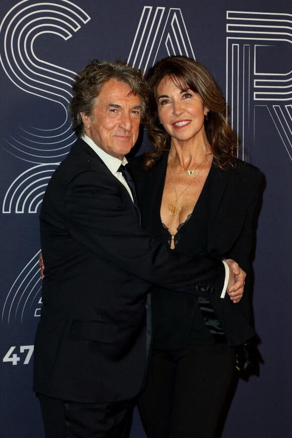 François Cluzet et sa femme Narjiss Slaoui-Falcoz - Photocall de la 47ème édition de la cérémonie des César à l'Olympia à Paris, le 25 février 2022. © Borde-Jacovides/Bestimage 