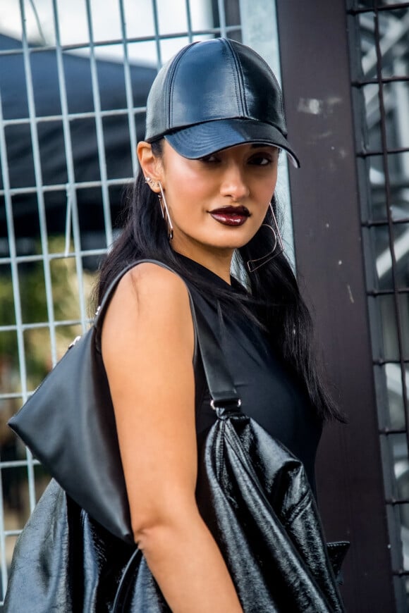 Amina Muaddi - Arrivées au défilé Courrèges Collection Femme Prêt-à-porter Printemps/Eté 2023 lors de la Fashion Week de Paris, France, le 27 septembre 2022. © Baptiste Autissier/Panoramic/Bestimage 